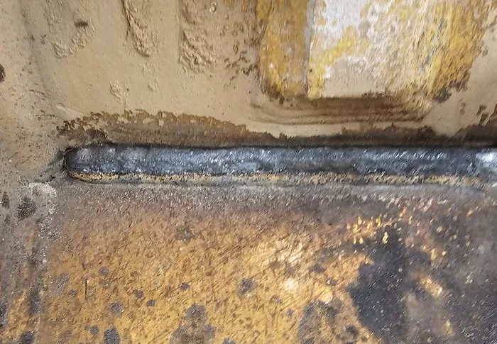 A close look at a structural weld seam.